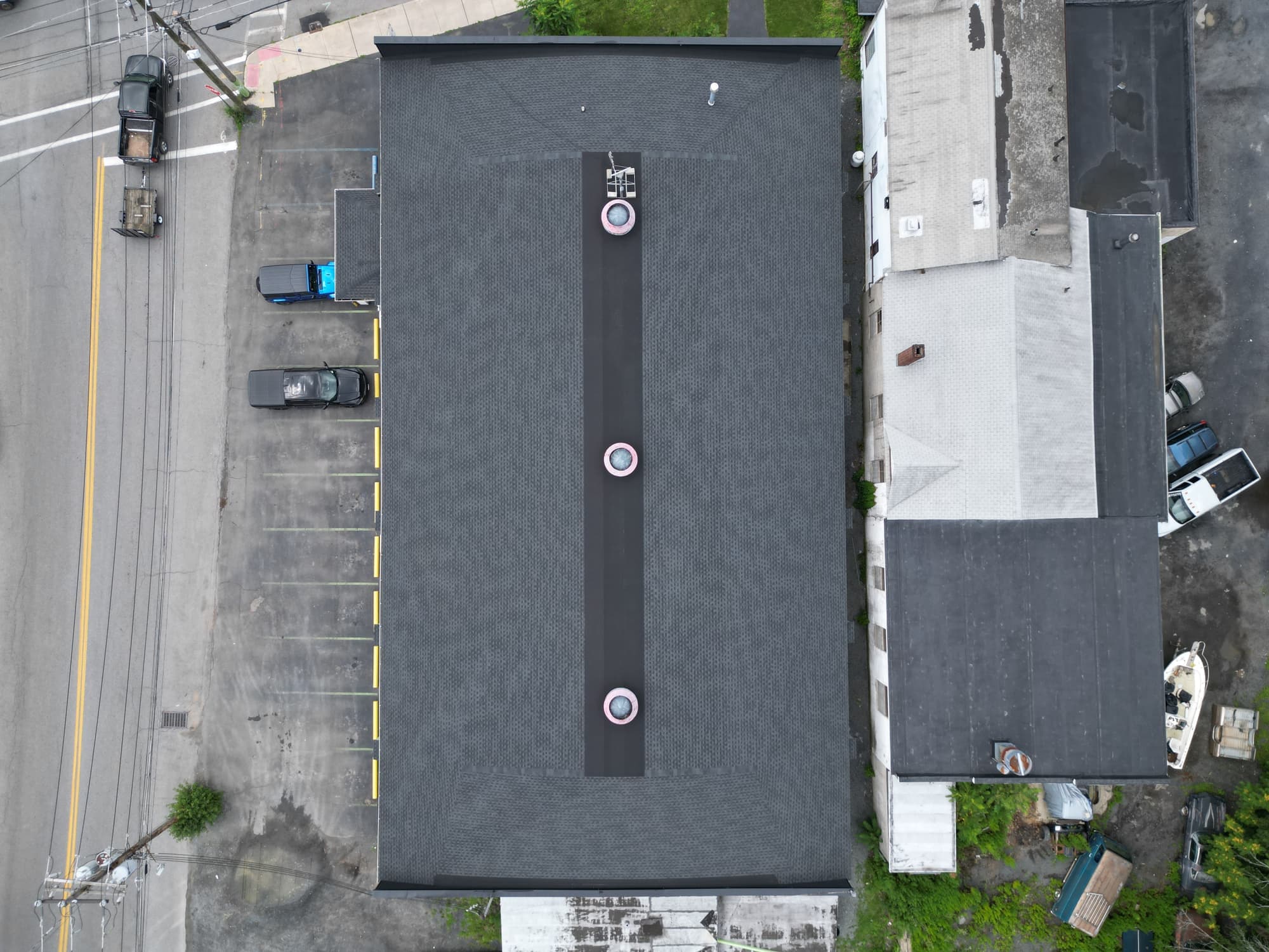 Top down drone view of a commercial flat roof