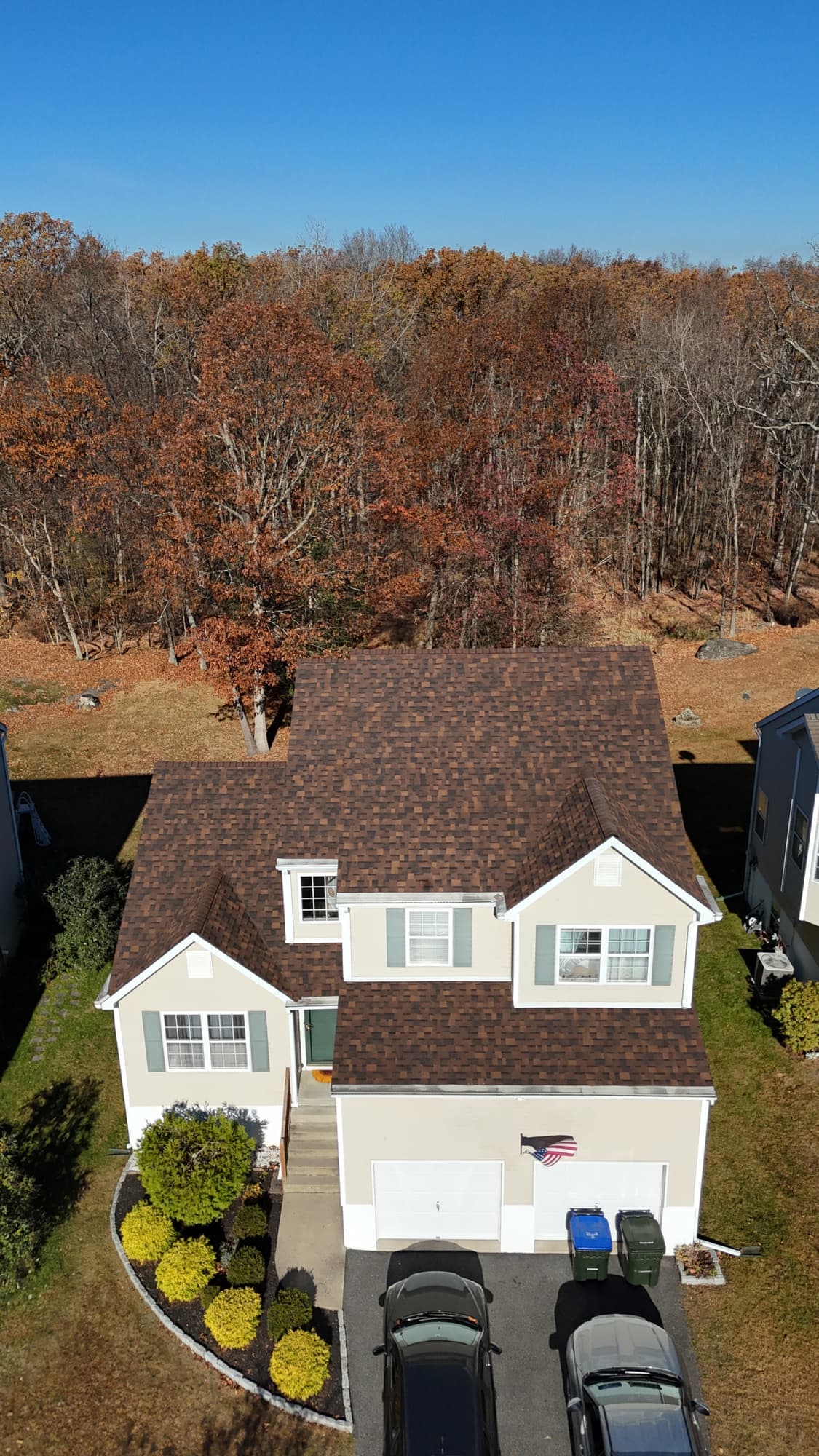 Aerial view of a new brown architectural shingle roof in Washingtonville, NY